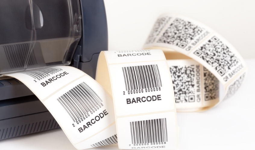 Barcode labels and QR code roll labels being printed