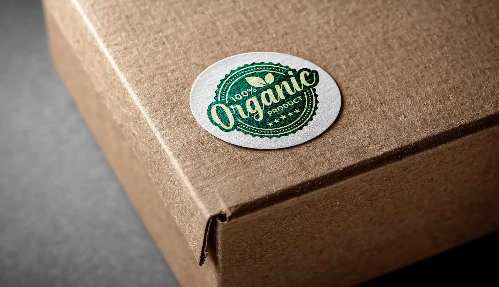 A green 100% Organic circle label on a cardboard box.