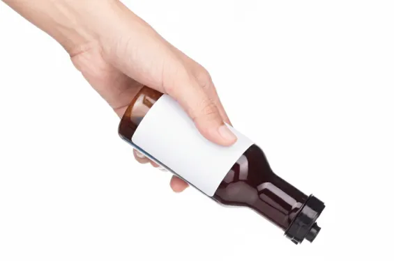 Glass jar with chocolate spread and blank label