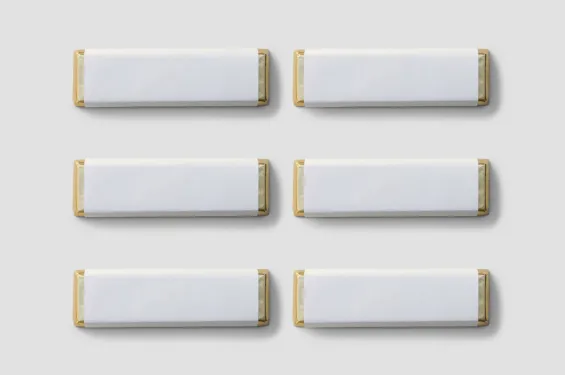Six chocolate bars with blank labels