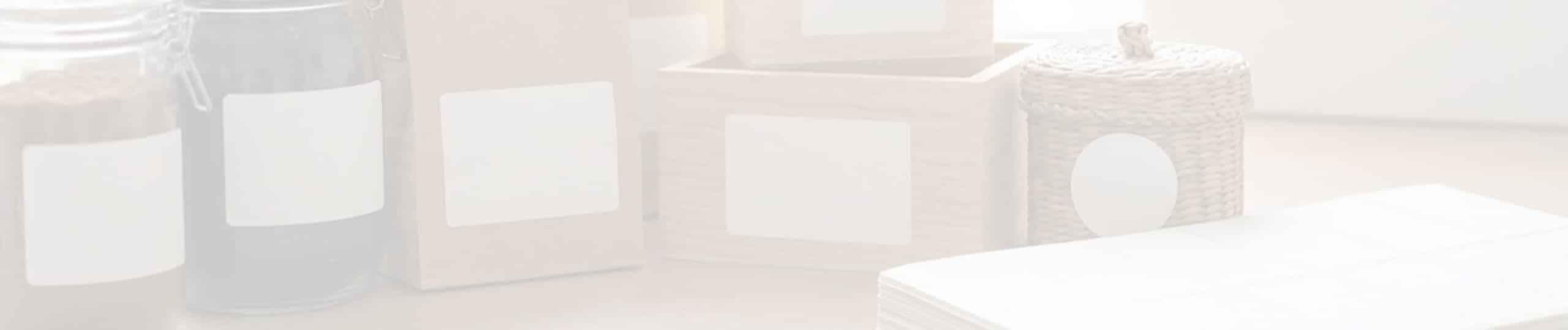 Small business owner arranging custom product labels on handmade candles and skincare jars